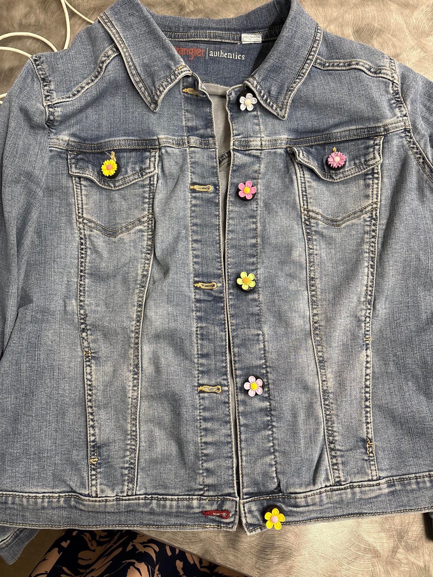 Floral jeweled button close up